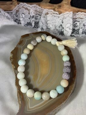 Matte Pastel Amazonite and Lava Stone Beaded Stretch Bracelet with Cream Tassel